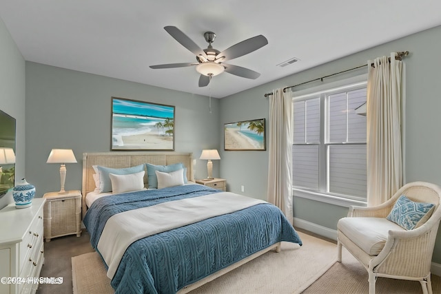 carpeted bedroom featuring ceiling fan