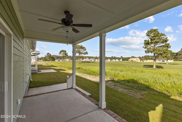 view of patio / terrace featuring ceiling fan