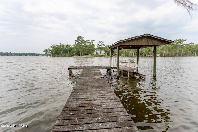 dock area featuring a water view