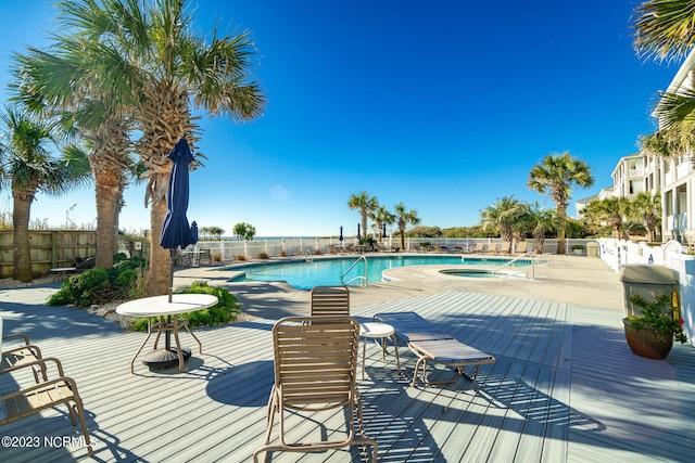 view of pool featuring a hot tub