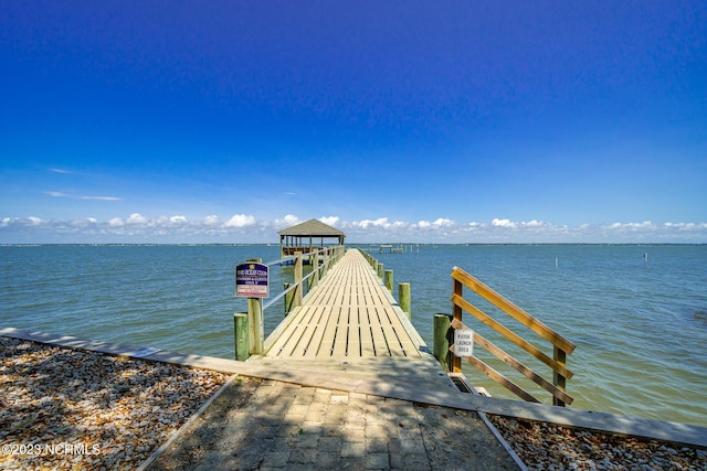 view of dock with a water view