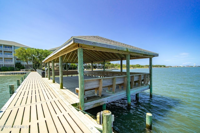 view of dock with a water view