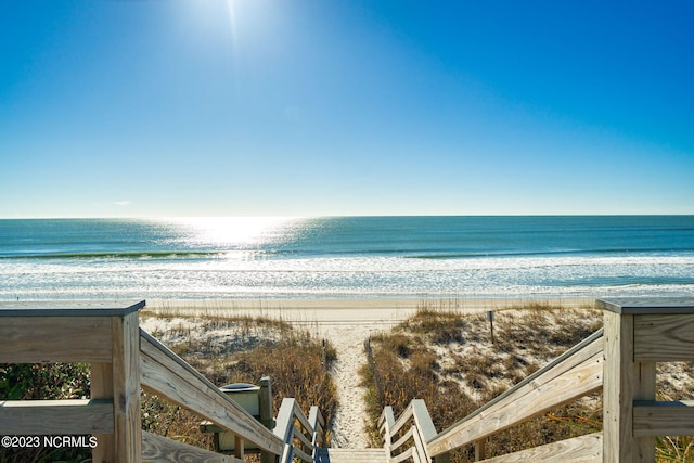 property view of water featuring a beach view