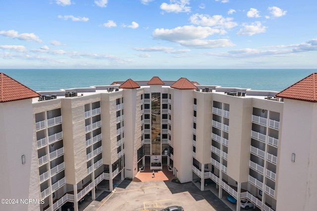 view of property with a water view