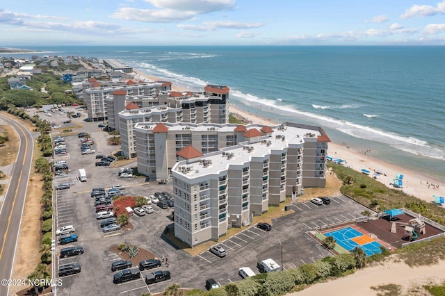 aerial view featuring a beach view and a water view