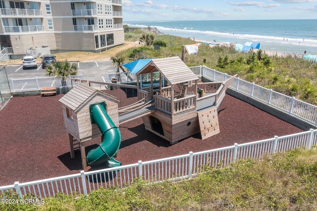 aerial view with a view of the beach and a water view