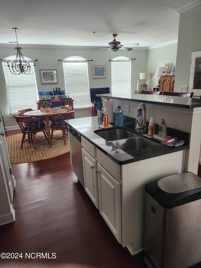 kitchen with a center island with sink, dark wood-type flooring, a sink, white cabinetry, and stainless steel dishwasher