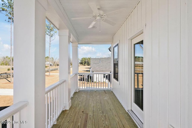 balcony featuring ceiling fan and covered porch