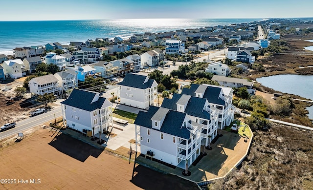 aerial view with a water view and a residential view