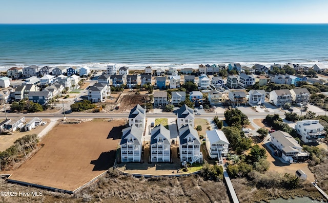 aerial view with a residential view and a water view