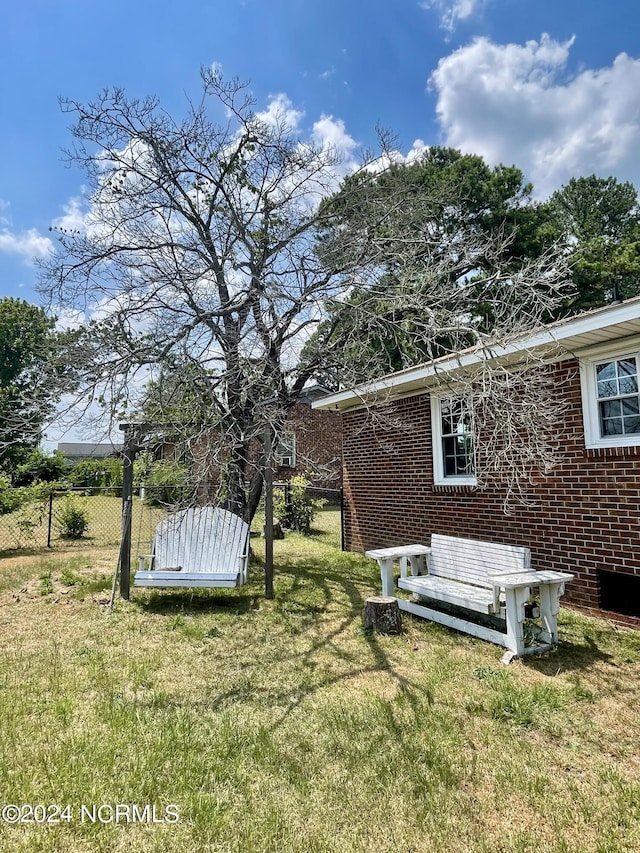 view of yard with fence