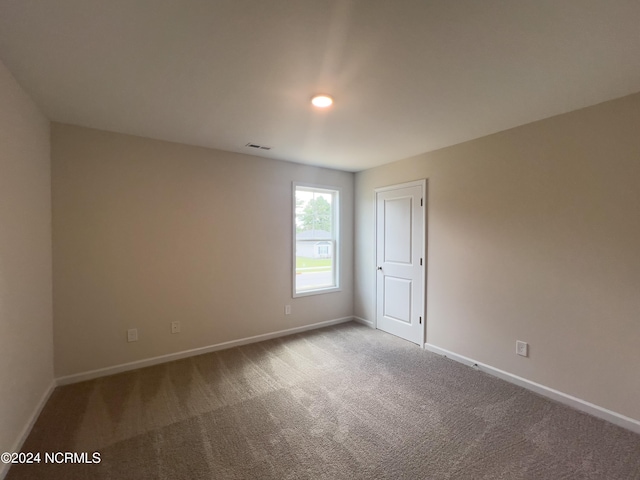 view of carpeted spare room