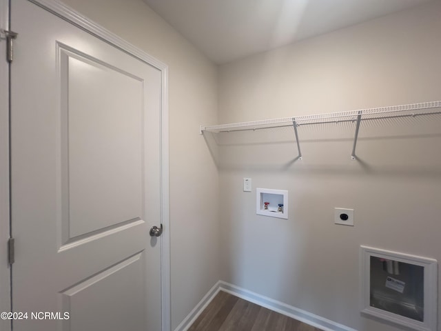 clothes washing area featuring washer hookup, electric dryer hookup, and dark hardwood / wood-style floors