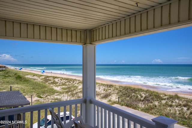 view of water feature with a beach view