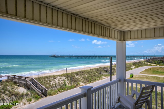 property view of water featuring a beach view