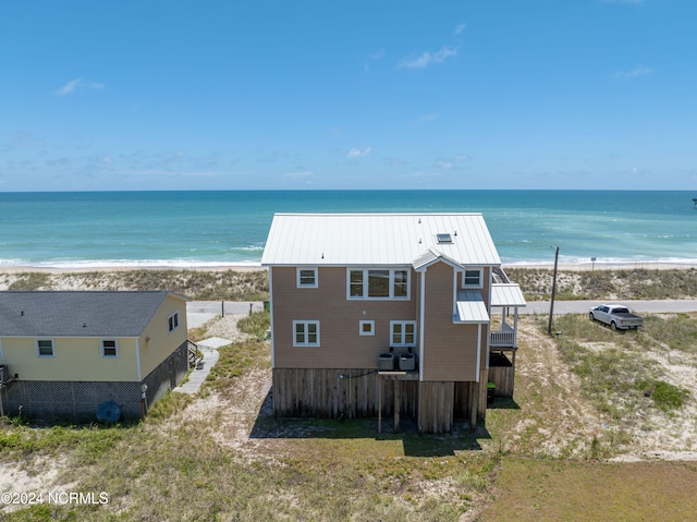 exterior space with a beach view