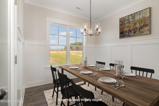 198 Ruskin Dr, Smithfield, NC 27577 - dining room featuring ornamental molding, dark wood-type flooring, and a chandelier