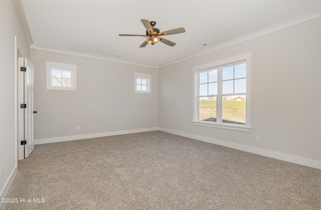 unfurnished room featuring carpet floors, plenty of natural light, crown molding, and ceiling fan