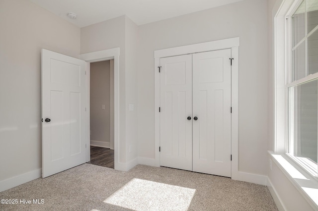 198 Ruskin Dr, Smithfield, NC 27577 - unfurnished bedroom featuring carpet floors and a closet