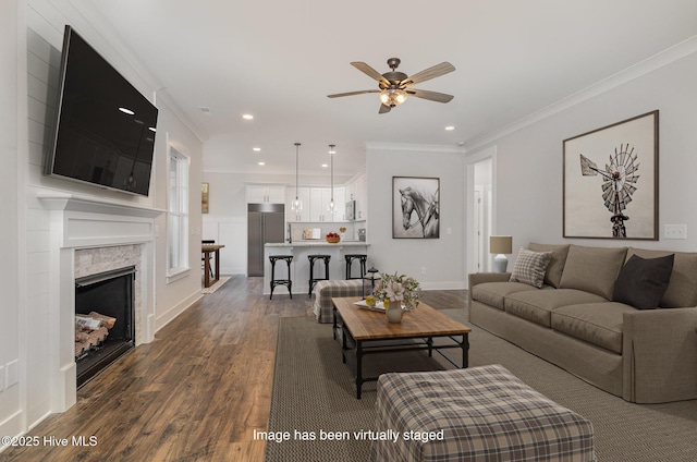 198 Ruskin Dr, Smithfield, NC 27577 - living room with ceiling fan, dark hardwood / wood-style flooring, and ornamental molding