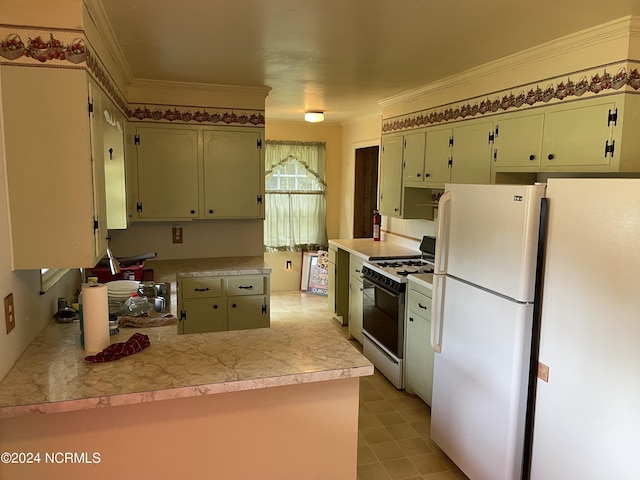 kitchen with ornamental molding, freestanding refrigerator, a peninsula, light countertops, and gas stove