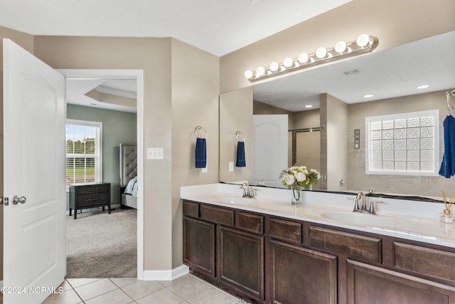 bathroom featuring tile patterned floors and vanity