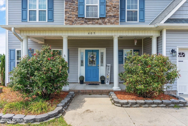 property entrance with a porch