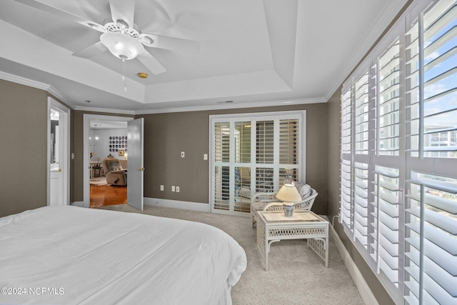 bedroom with multiple windows, ceiling fan, light carpet, and ornamental molding