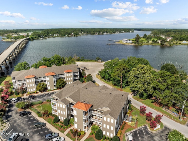 birds eye view of property featuring a water view