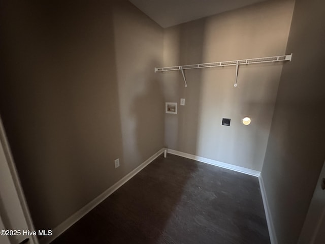 clothes washing area featuring hookup for a washing machine and hookup for an electric dryer