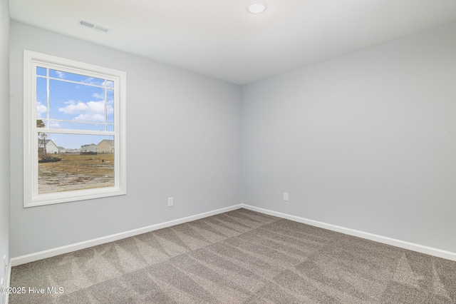 view of carpeted spare room