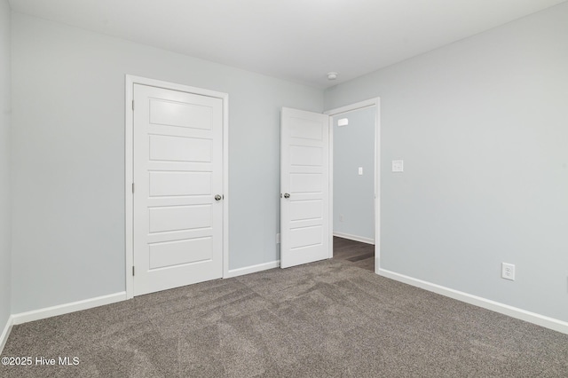 unfurnished bedroom featuring carpet floors