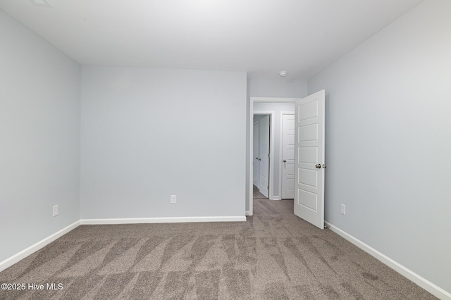 unfurnished bedroom featuring carpet floors