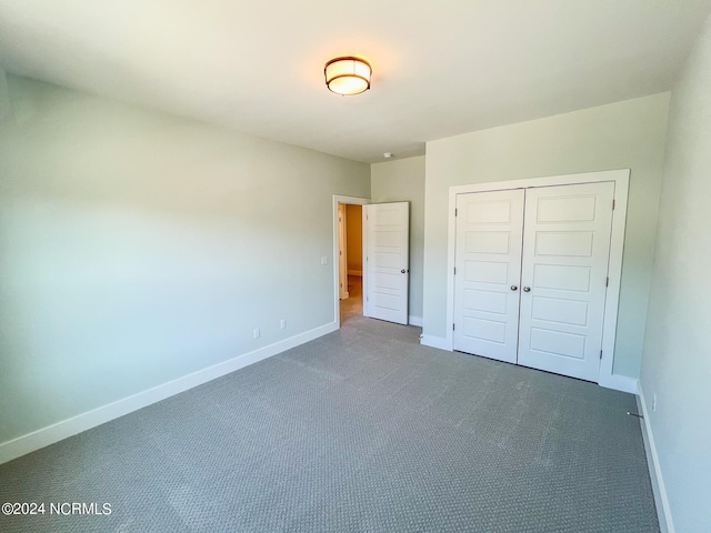 unfurnished bedroom featuring a closet