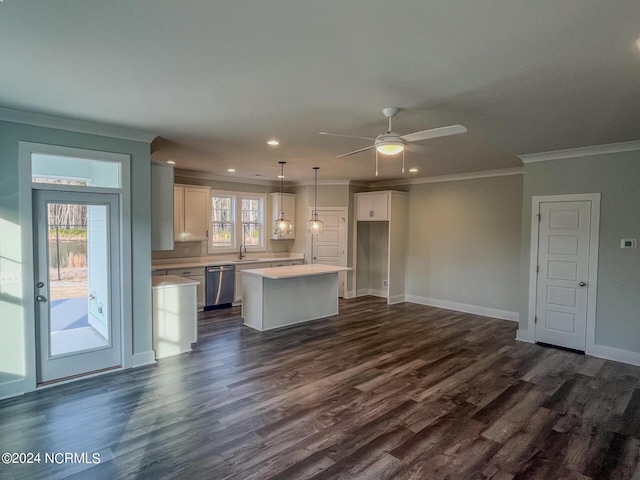 kitchen featuring white cabinets, stainless steel dishwasher, dark hardwood / wood-style flooring, and a center island