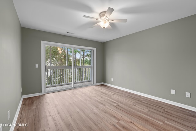 unfurnished room with ceiling fan and light hardwood / wood-style flooring