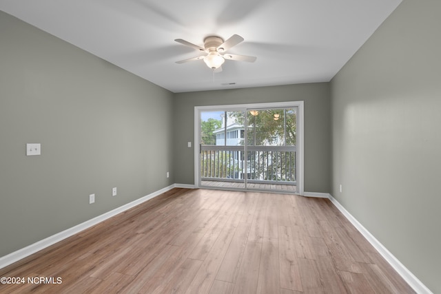 spare room featuring ceiling fan and light hardwood / wood-style floors