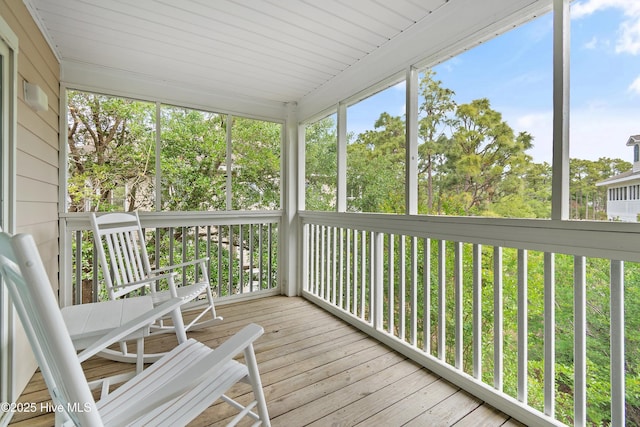 sunroom featuring plenty of natural light
