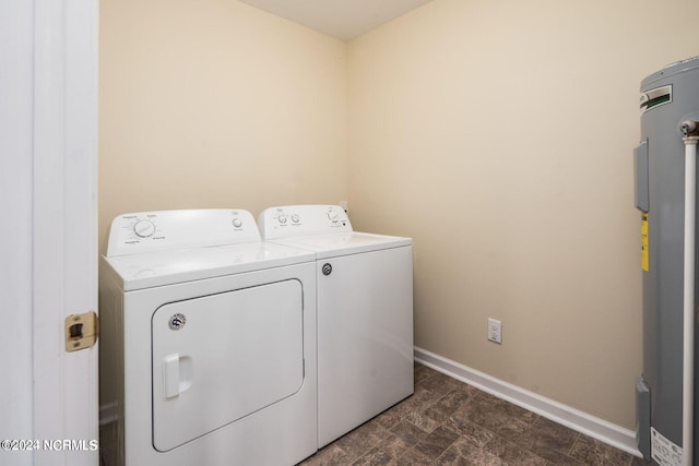 laundry room featuring independent washer and dryer and water heater