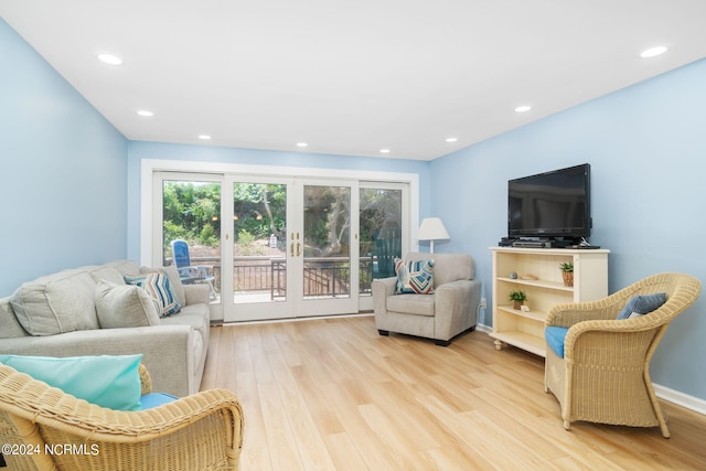 living room with light hardwood / wood-style flooring