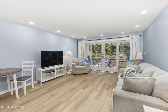 331 Salter Path Rd Unit 104, Pine Knoll Shores, NC 28512 - living area with french doors, light wood-style floors, and recessed lighting