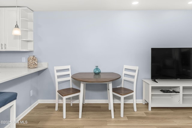 331 Salter Path Rd Unit 104, Pine Knoll Shores, NC 28512 - dining space featuring light wood-type flooring, baseboards, and recessed lighting