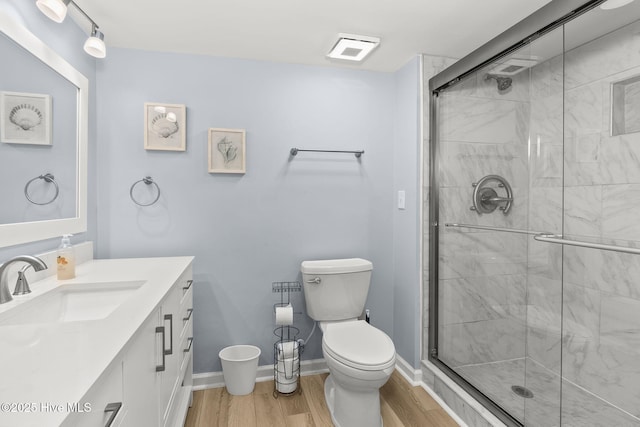 331 Salter Path Rd Unit 104, Pine Knoll Shores, NC 28512 - full bath featuring vanity, toilet, wood finished floors, and a stall shower