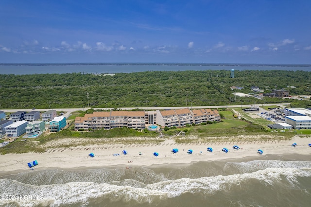 aerial view featuring a view of the beach and a water view