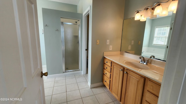 bathroom with tile patterned floors, vanity, and plus walk in shower