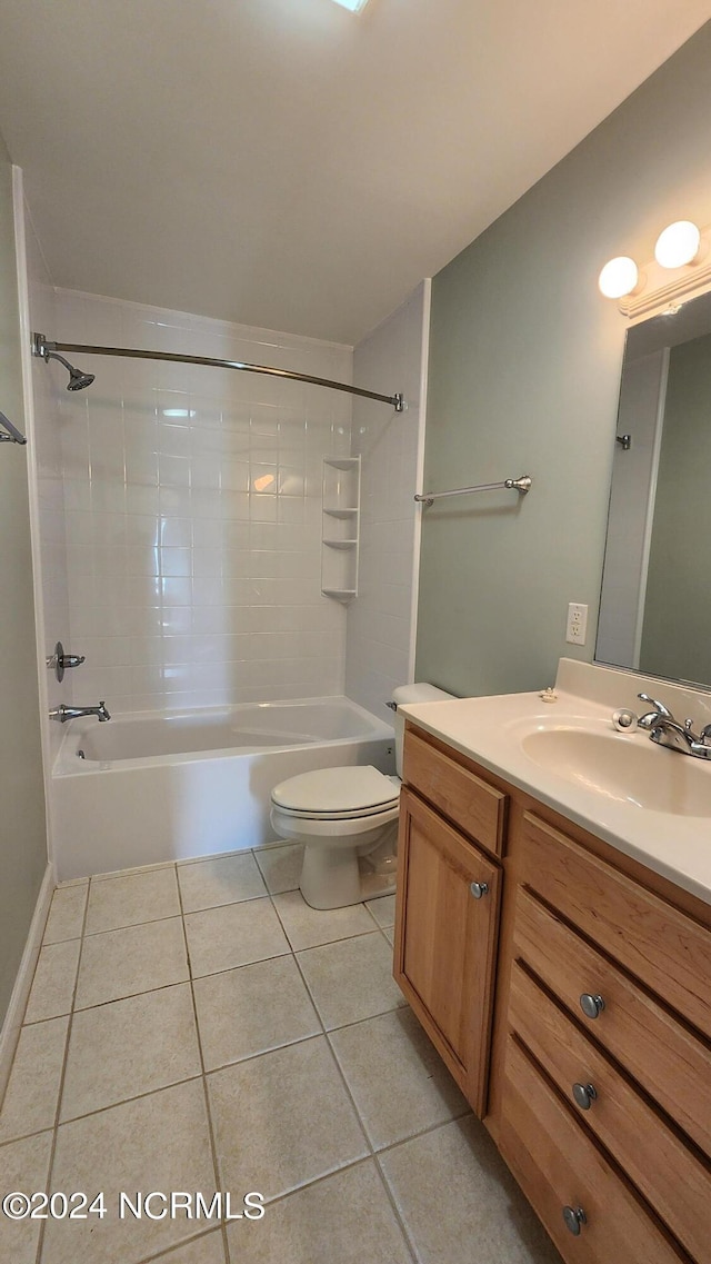 full bathroom featuring shower / washtub combination, tile patterned flooring, vanity, and toilet