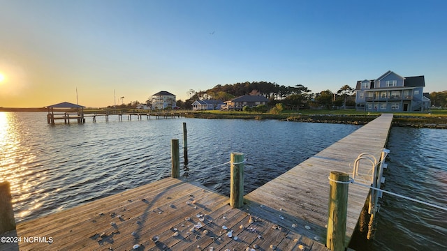 dock area featuring a water view