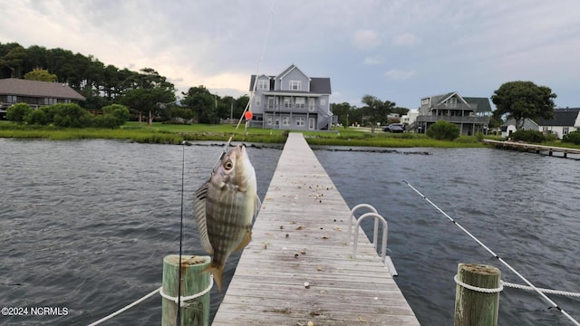 view of dock featuring a water view