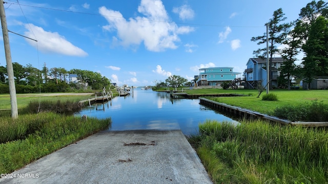 water view featuring a dock