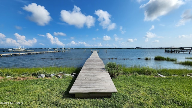 dock area featuring a water view